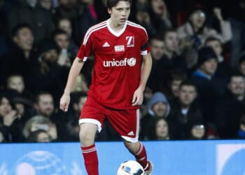Brooklyn Beckham's former football coach has said he felt sadness at his 'crackers' life in the public eye and worried about the 'shy and polite' star (Brooklyn seen in 2015)