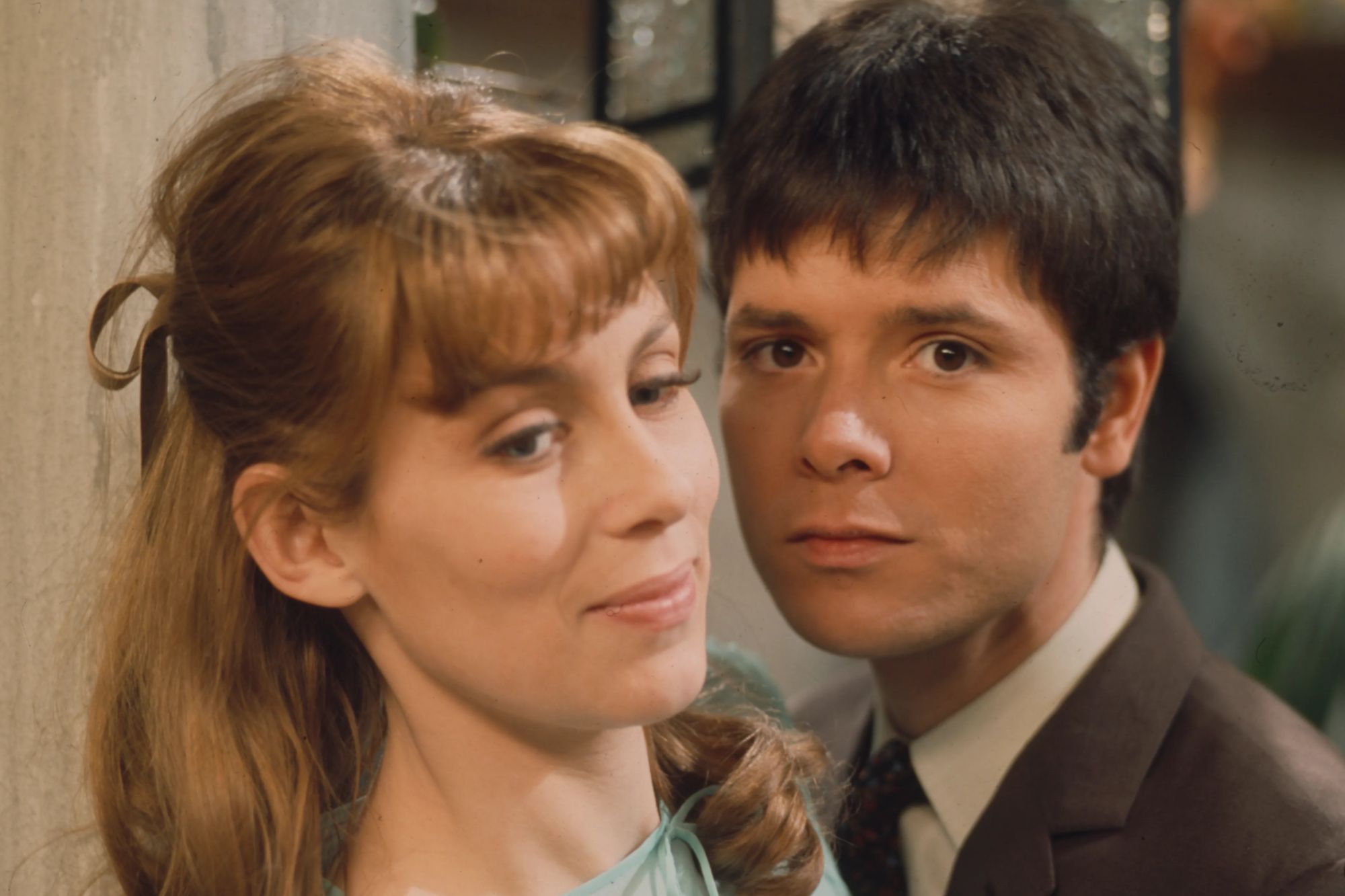 An image collage containing 1 images, Image 1 shows Cliff Richard and Marian Diamond on the set of 'Playhouse - A Matter Of Diamonds'