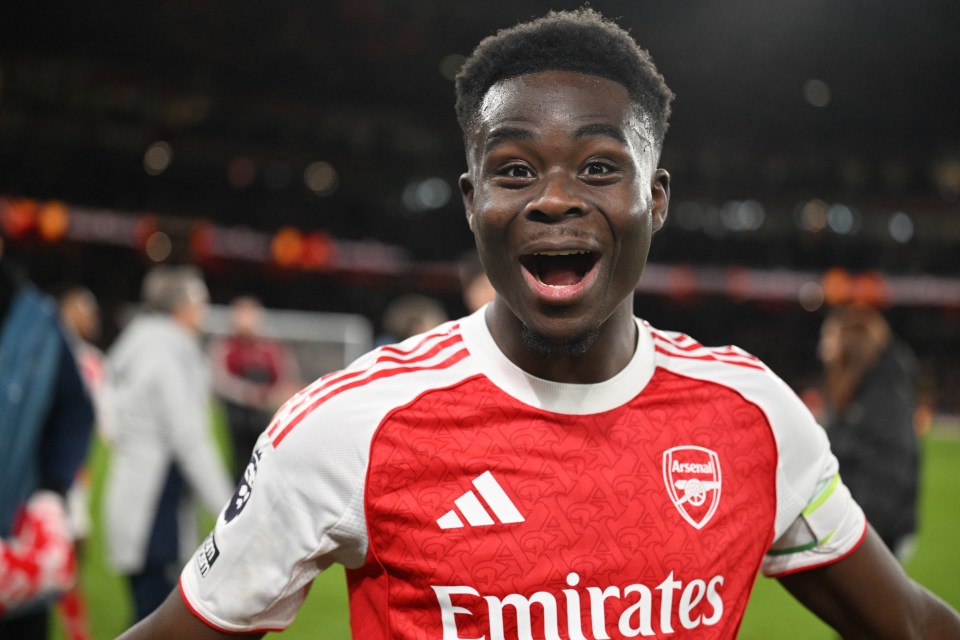 Bukayo Saka celebrating after a Premier League match.