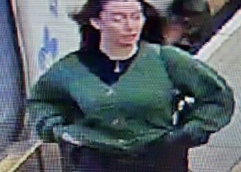 The woman in the photos has long dark hair and is pictured wearing a green cardigan and a pair of black mini shorts