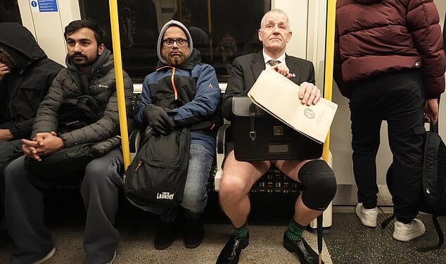 A man takes part in the annual No Trousers Tube Ride on the London Underground yesterday