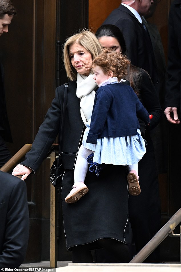 Caroline Kennedy held her granddaughter as she attended the funeral of her daughter, Tatiana Schlossberg, in New York