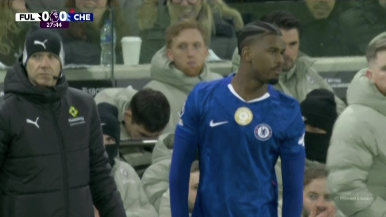 A Chelsea player on the field, with the score FUL 0-0 CHE, 27:44 on the scoreboard.