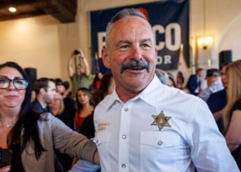 Riverside County Sheriff Chad Bianco mingles through the crowd after announcing his bid for governor at Avila's Historic 1929 Event Center on Feb. 17, 2025, in Riverside, California.