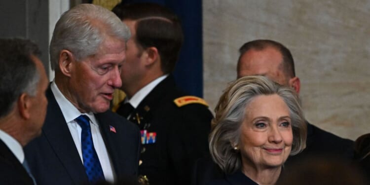 Former President Bill Clinton and former Secretary of State Hillary Clinton arrive at the 60th inaugural ceremony where Donald Trump was sworn in as the 47th president on Jan. 20, 2025, in the U.S. Capitol Rotunda in Washington, D.C.