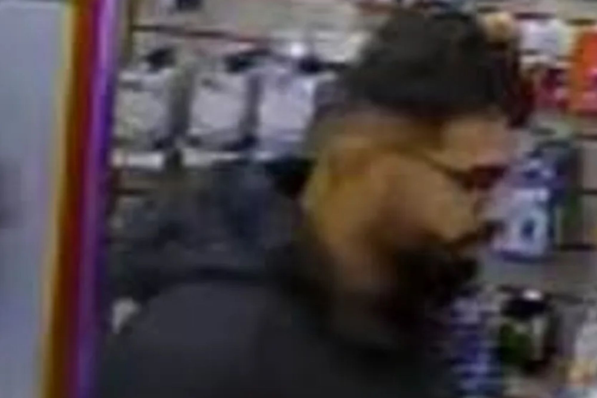 An image collage containing 1 images, Image 1 shows Security footage of a man with dark hair and a beard, wearing glasses and a black hoodie, looking at products in a store