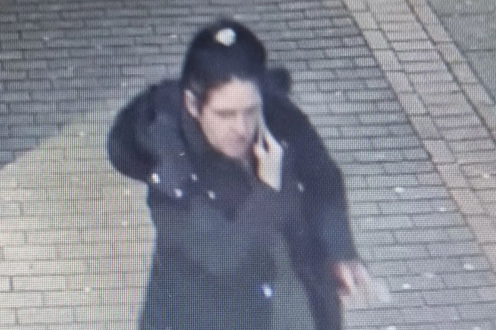 An image collage containing 1 images, Image 1 shows CCTV image of a woman, Kayleigh, in a dark coat walking and talking on a phone
