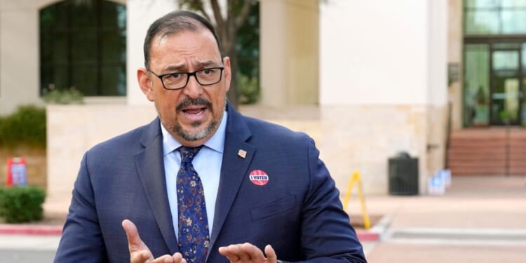 Arizona Secretary of State Adrian Fontes speaks during a news conference after voting on the first day of early in-person voting for the general election at Surprise City Hall on Oct. 9, 2024, in Surprise, Arizona.