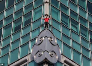 Daredevil Alex Honnold starts nerve-shredding climb of 101-story tower in Taiwan without ropes live on Netflix