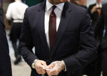 David Beckham enjoyed a slap-up lunch at a down-to-earth local Parisian restaurant on Wednesday - as his son Brooklyn and his wife Nicola bragged about a recent lavish trip away