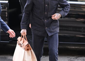 Sir David Beckham's international tour continued on Monday as he arrived in Paris ahead of Haute Couture Fashion Week - and more questions about his relationship with son Brooklyn