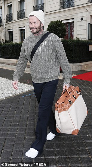 David added white trainers and dark jeans to his low-key ensemble