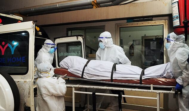 The infection is caused by the Nipah virus, a rare but highly dangerous pathogen that can trigger severe breathing problems, seizures and fatal swelling of the brain. Pictured: the aftermath of a 2023 outbreak in India