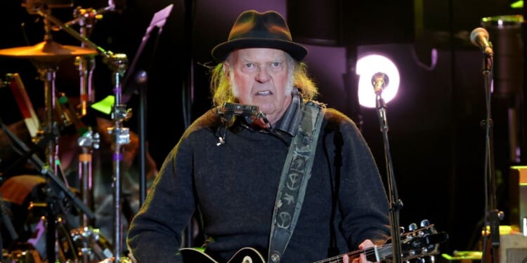 Neil Young performs onstage at Light Up the Blues 7 Concert Celebrating Autism Speaks' 20th Anniversary at the Greek Theatre on April 26, 2025, in Los Angeles, California.