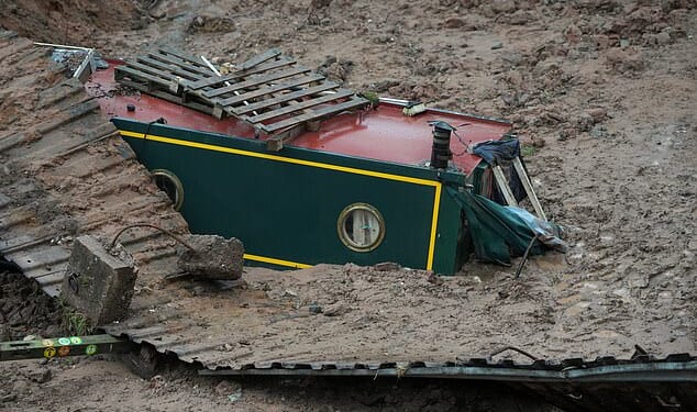 Three narrowboats were dragged to the depths of a gaping canal collapse in Shropshire