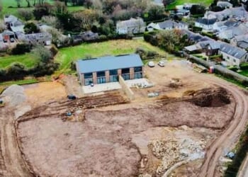 Locals have accused a wealthy developer of causing a planning 'apocalypse' after converting a barn into newbuild homes worth more than £1million