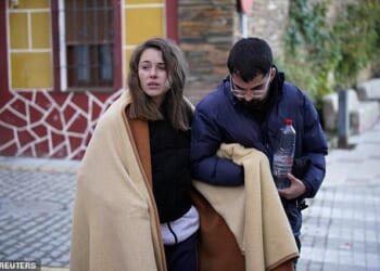 Ana Garcia Aranda, pictured on Monday, made a desperate plea for help to find her dog who vanished during Sunday's train crash - which left her hurt