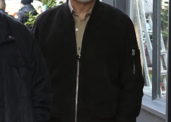 David Walliams looked downcast as he arrived at a children's event promising 'plenty of Walliams-style mischief' in his first public appearance since his fall from grace last month