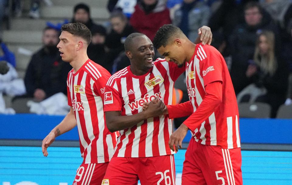 Berlin, Germany. 28th Jan, 2023. *** CORRECTS META DATE SET *** Soccer: Bundesliga, Hertha BSC - 1. FC Union Berlin, Matchday 18, Olympiastadion, Union's Jerome Roussilon (M) and Union's Janik Haberer (l) celebrate the 1:0 goal of Union's Danilho Doe
