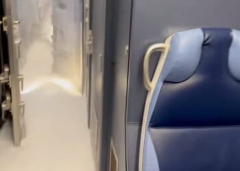 Eerie moment train is filled with SNOW as historic winter storm cancels another 4,000 flights: Live updates