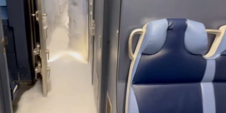 Eerie moment train is filled with SNOW as historic winter storm cancels another 4,000 flights: Live updates