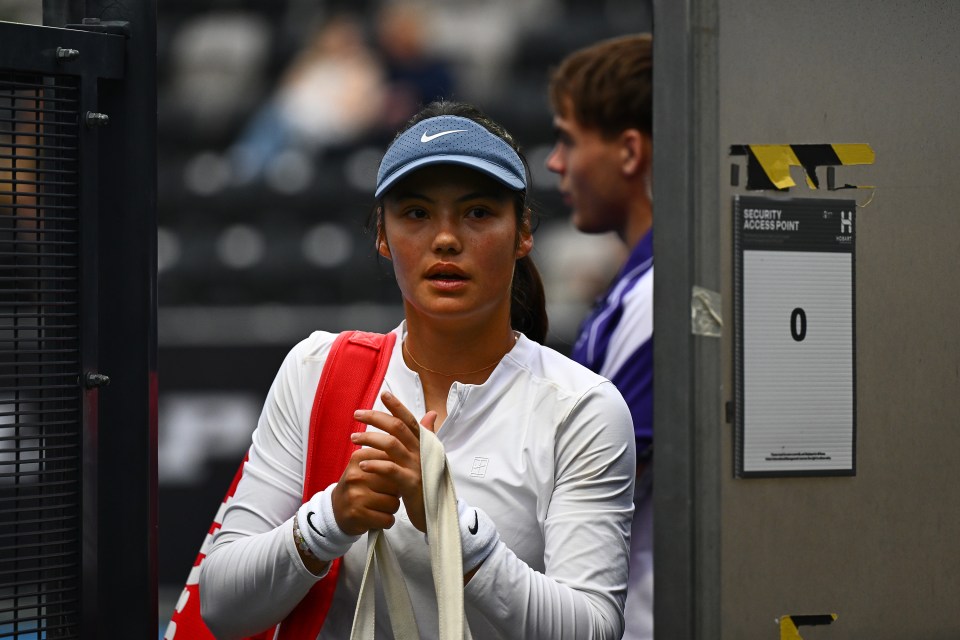 Emma Raducanu of Great Britain leaves the court after being defeated.