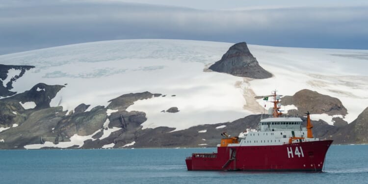 Polar ship Admiral Maximiano at anchor in Admiralty Bay with Nunatak Tern in the background, on Jan. 12, 2020, in King George Island, Antarctica.