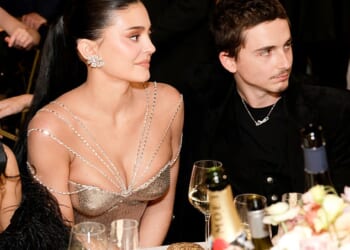 As they took their seats with fellow celebrity guests before the ceremony got underway, snatched footage reveals a seemingly fierce exchange between Kylie Jenner and Timothee- no matter how much they tried to mask their tense words behind smiles.