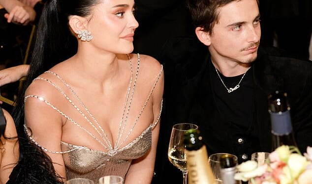 As they took their seats with fellow celebrity guests before the ceremony got underway, snatched footage reveals a seemingly fierce exchange between Kylie Jenner and Timothee- no matter how much they tried to mask their tense words behind smiles.