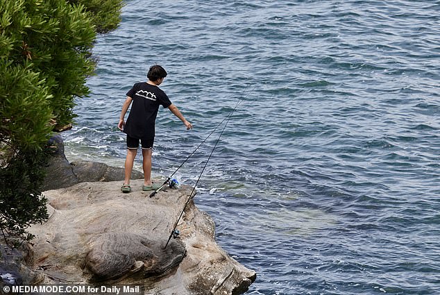 A young boy was seen fishing metres from the attack location