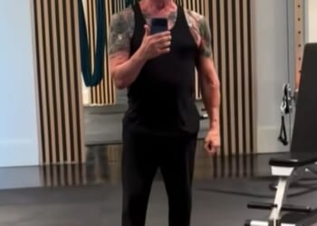 Sylvester Stallone showcased his tattooed biceps in rare footage of himself inside the gym of his $35.3 million Palm Beach, FL mansion on Sunday