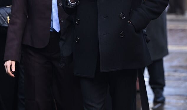 Rivals stars Alex Hassell and Bella Maclean arrive at the memorial service for Dame Jilly Cooper today