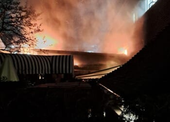 The sky was lit up bright orange as the flames raged in the rooftop garden bar at the top of the nine storey office block in High Street Kensington