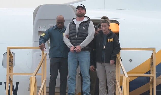 Stunning new footage has emerged of Ryan Wedding arriving in the US in handcuffs