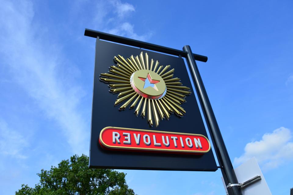 Revolution Bar sign in Beaconsfield, Buckinghamshire, England.