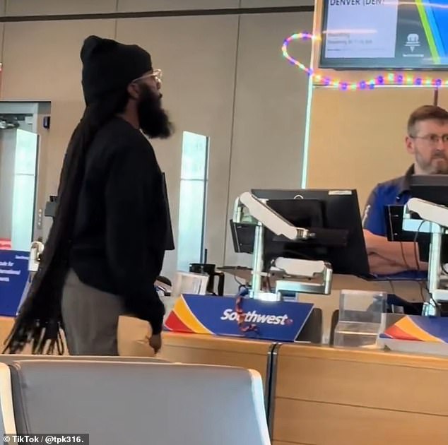An irate passenger was caught on camera threatening a Southwest employee at Kansas City International Airport on Monday