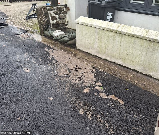 Faeces and toilet roll lay outside a home in the village of Stithians in Cornwall, as residents demand action to stop the perennial problem