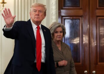 President Donald Trump departs with White House Chief of Staff Susie Wiles following a roundtable discussion in the State Dining Room of the White House on Oct. 8, 2025, in Washington, D.C.