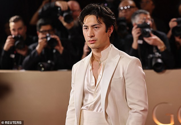 Hudson Williams poses on the red carpet at the 83rd Annual Golden Globes in Beverly Hills, California, U.S., January 11, 2026. REUTERS/Daniel Cole
