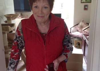 Anne Hughes, 71, (pictured in 2024) was stood outside her village newsagents when the shutters began to open