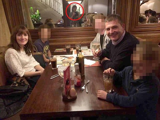 Enjoying a night out together: Maria Chenery-Woods, 56, (circled in the reflection) with her TV producer daughter, Paige, pictured left, and her partner Mark Woods, 61, right