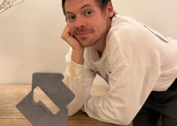 It's a double whammy for One Direction fans after Harry Styles (pictured) and Louis Tomlinson both topped the UK Singles and Album charts respectively on Friday