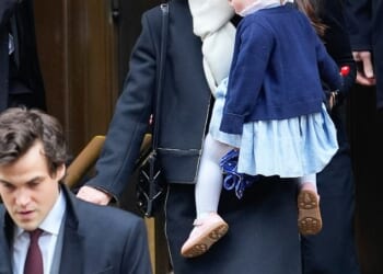 Caroline Kennedy carries her one-year-old granddaughter, Josephine, as she leaves her daughter's funeral earlier this week