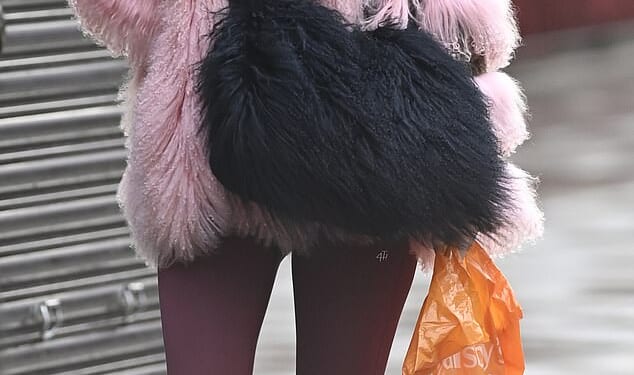 Helen Flanaganfeels like she is being forced out of her £1 million family home by her ex Scott Sinclair, as their bitter feud takes a new turn (pictured on Friday)