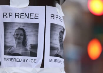A picture is displayed at a makeshift memorial for Renee Nicole Good, who was shot and killed at point blank range on Jan. 7, 2026, by a U.S. Immigration and Customs Enforcement agent as she apparently tried to drive her car toward agents in in Minneapolis, Minnesota.