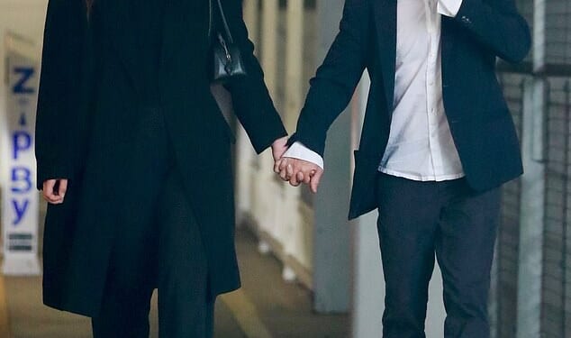 Sean Penn and his girlfriend, Valeria Nicov, were seen holding hands in a rare public display of affection, just days after he sparked controversy for smoking during the Golden Globe Awards