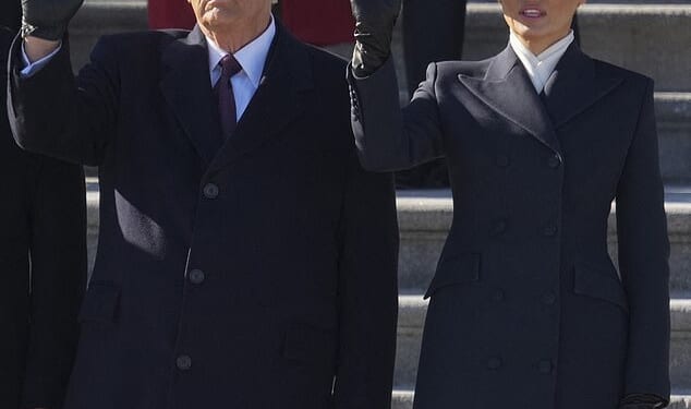 Melania Trump wearing The Hat – the millinery equivalent of a barbed-wire fence – the brim so large it allowed her to repel Donald’s lips when he tried to kiss her