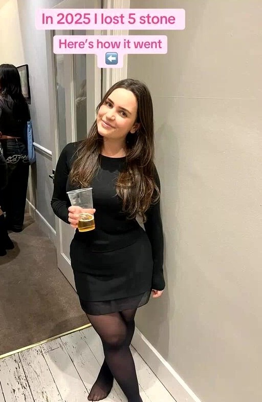 A woman in a black dress holding a drink with text overlay: "In 2025 I lost 5 stone Here's how it went".