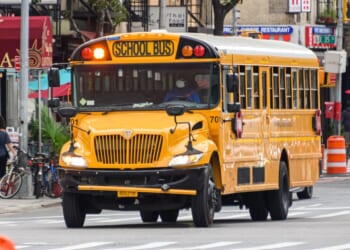 A school bus transports students through the New York and New Jersey areas on Aug. 17, 2020.