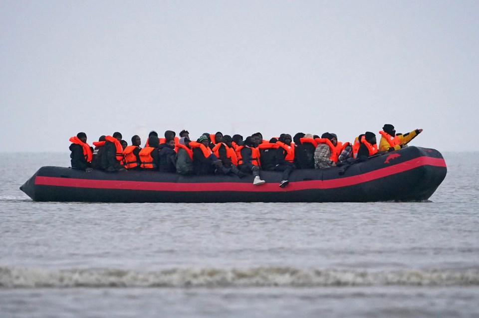 Migrants in a small boat in Gravelines, France.